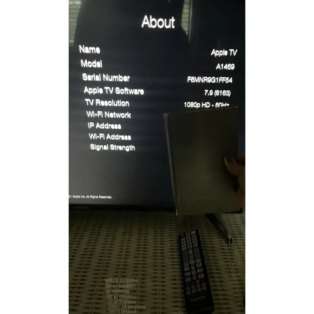 Apple TV 3rd generation HD media, model A1469, with power cable and HDMI cable
